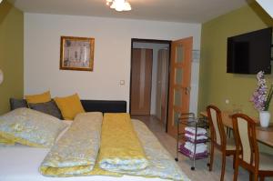Posteľ alebo postele v izbe v ubytovaní Hotel Olga
