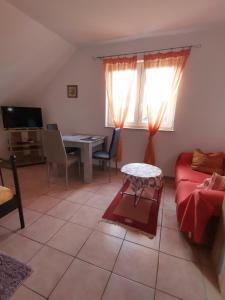 TV a/nebo společenská místnost v ubytování Apartment OG 2