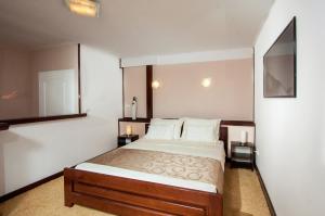 Postel nebo postele na pokoji v ubytování Apartments Šebelja