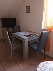 TV a/nebo společenská místnost v ubytování Apartment OG 2