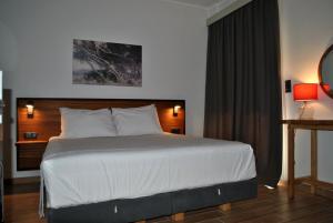 Postel nebo postele na pokoji v ubytování Eleni's Sea View Adults only