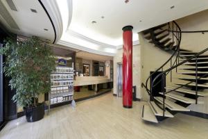 The lobby or reception area at Hotel Trafalgar