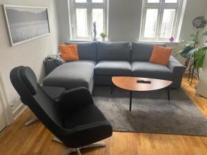 Area tempat duduk di Hyggelig lejlighed i Hjørring centrum
