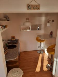 Posezení v ubytování Studio-Appartements Emwey + 37 fotografií
