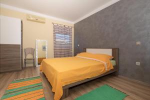 Кровать или кровати в номере Apartments Bartol