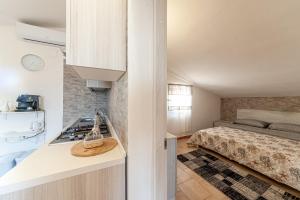 A bed or beds in a room at Tramontana