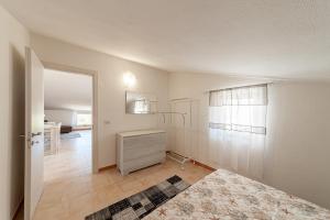 A bed or beds in a room at Tramontana