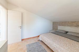 A bed or beds in a room at Tramontana
