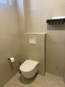 Kúpeľňa v ubytovaní M Plus Residence