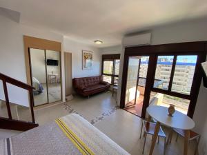 Posteľ alebo postele v izbe v ubytovaní Benalmadena ALOHA PLAYA SEA VIEW LOFT