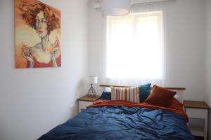 Postel nebo postele na pokoji v ubytování Art Home Eger