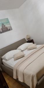 Postel nebo postele na pokoji v ubytování Apartment Lara