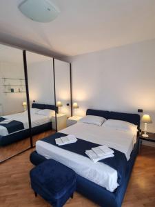 Postel nebo postele na pokoji v ubytování Casa a Vecchiano nei pressi Pisa, Lucca e Versilia