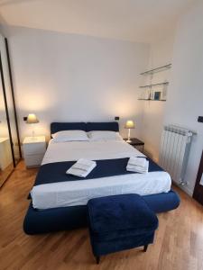 Postel nebo postele na pokoji v ubytování Casa a Vecchiano nei pressi Pisa, Lucca e Versilia