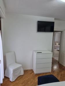 TV a/nebo společenská místnost v ubytování Casa a Vecchiano nei pressi Pisa, Lucca e Versilia