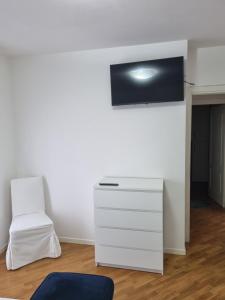 TV a/nebo společenská místnost v ubytování Casa a Vecchiano nei pressi Pisa, Lucca e Versilia