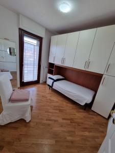 Postel nebo postele na pokoji v ubytování Casa a Vecchiano nei pressi Pisa, Lucca e Versilia