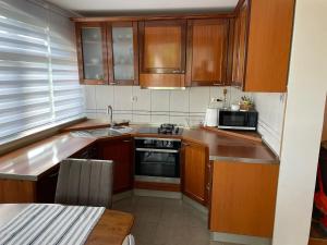 Kuchyňa alebo kuchynka v ubytovaní Apartment Finally