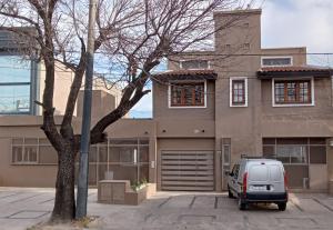 a van parked in front of a house at El Puerto - Cerca de todo in Cordoba