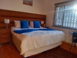 Кровать или кровати в номере G Guest House