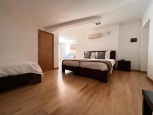 Uma cama ou camas num quarto em Vale do Zêzere Hotel