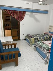 Postel nebo postele na pokoji v ubytování Dareen Hotel