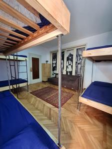 Postel nebo postele na pokoji v ubytování Milingona City Center Hostel