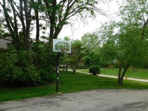 a basketball hoop in the middle of a park at Office + 5 BR, Movie Theater , Creve Coeur -10 Sleep surface in Creve Coeur