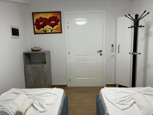 Postel nebo postele na pokoji v ubytování Apartment Elbasan city center 2