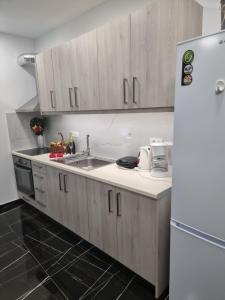 Kuchyň nebo kuchyňský kout v ubytování Istron Corner Apartments