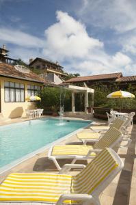 A piscina localizada em Pousada Cabanas Porto Belo ou nos arredores