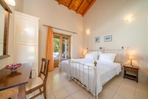 Posteľ alebo postele v izbe v ubytovaní Villa Delfini by Villa Plus