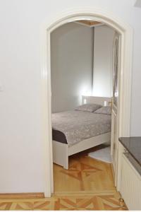 Postel nebo postele na pokoji v ubytování Elite House