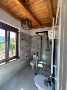 Koupelna v ubytování El hotel de Verdiago