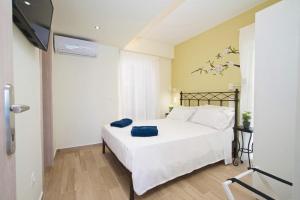 Posteľ alebo postele v izbe v ubytovaní Villa Michou Thalassa by Villa Plus