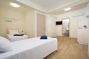 Posteľ alebo postele v izbe v ubytovaní Villa Michou Thalassa by Villa Plus