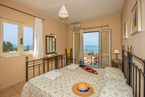 Posteľ alebo postele v izbe v ubytovaní Villa Vounaki by Villa Plus + 20 fotografií