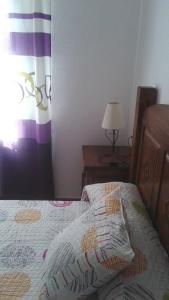 Postel nebo postele na pokoji v ubytování APARTAMENTO ANTONIA 1