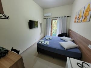 Postel nebo postele na pokoji v ubytování Hotel Serra do Mar
