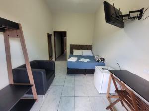TV a/nebo společenská místnost v ubytování Hotel Serra do Mar