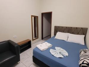 Postel nebo postele na pokoji v ubytování Hotel Serra do Mar