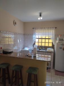 Η κουζίνα ή μικρή κουζίνα στο Casa Paraty - Jabaquara