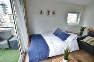 En eller flere senge i et værelse på Garden Tower flat