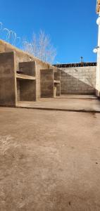 a concrete wall with steps and a stair case at LOS CACTUS in Malargüe +9 photos