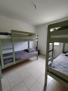 Posteľ alebo postele v izbe v ubytovaní Gîte - Zot Kaz