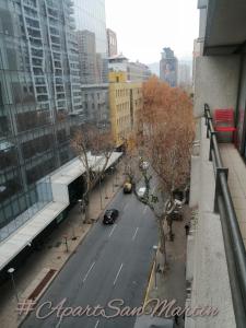 a view of a street in a city with buildings at Apart San Martín Departamento 2d 1b in Santiago