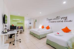 Postel nebo postele na pokoji v ubytování Little Home Ao Nang