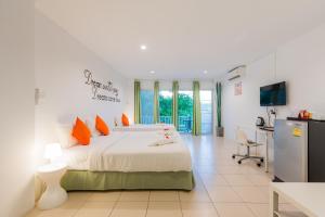 Postel nebo postele na pokoji v ubytování Little Home Ao Nang