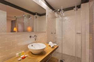 Koupelna v ubytování Prima City Hotel