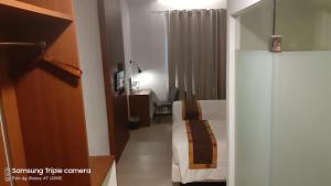 Postel nebo postele na pokoji v ubytování Xtra Hotel Bengkulu
